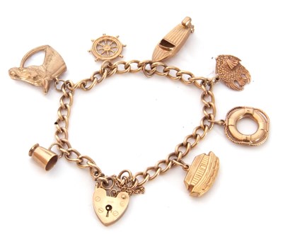 Lot 185 - 9ct gold curb link bracelet suspending seven...