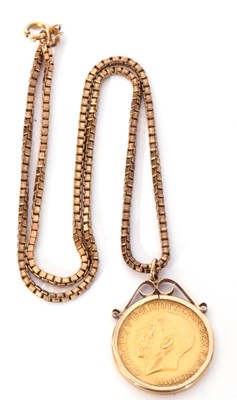 Lot 196 - George V gold sovereign framed in a 9ct gold...
