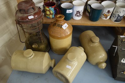 Lot 503 - THREE STONEWARE HOT WATER BOTTLES, A STONEWARE...
