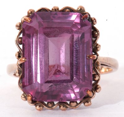Lot 126 - Synthetic spinel dress ring of rectangular cut,...