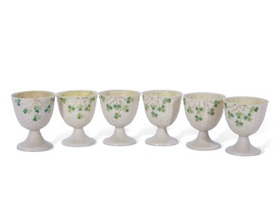 Lot 44 - Set of six Belleek egg cups decorated with...
