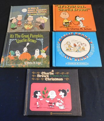Lot 56 - CHARLES M SCHULTZ: 5 titles: A CHARLIE BROWN...