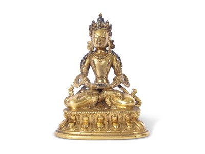 Lot 127 - Sino-Tibetan gilt bronze figure of a Buddha...