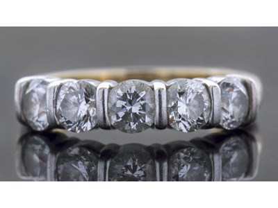 Lot 163 - Five stone diamond half hoop ring featuring...