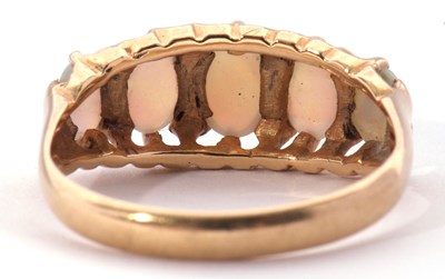 Lot 166 - 18ct gold five stone opal ring featuring five...