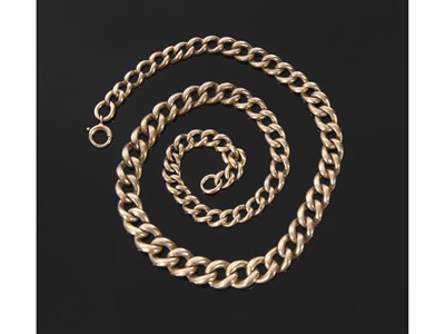 Lot 220 - 9ct gold graduated curb link chain, 17cm when...