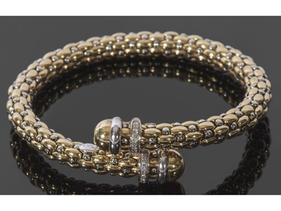 Lot 223 - Italian coil cross over design bracelet, each...