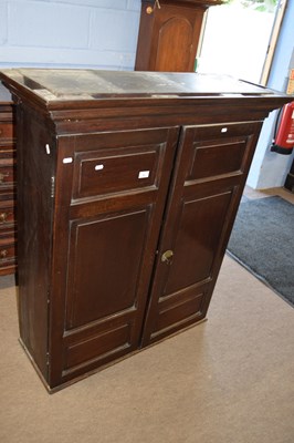 Lot 413 - Georgian oak two-door cupboard with moulded...