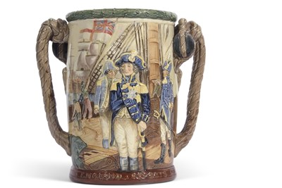 Lot 12 - A series ware vase with rope handles decorated...