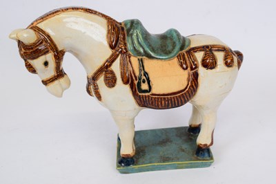 Lot 19 - Oriental model of a horse with Han or Tang...