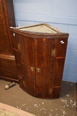 Lot 397 - Georgian oak and mahogany cross banded bow...