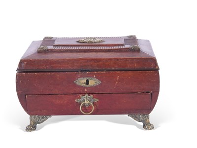 Lot 372 - Regency red leather and brass embossed jewel...