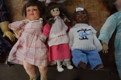 Lot 266 - Group of three small dolls, one with a...