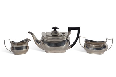 Lot 269 - Three-piece tea set of slightly compressed...