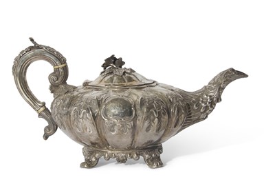 Lot 307 - Large Victorian Irish silver teapot of melon...