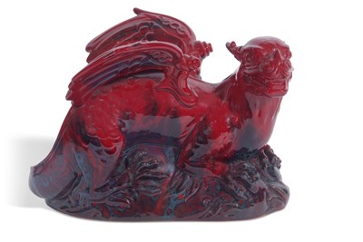 Lot 64 - Flambe figure of a dragon on rock work