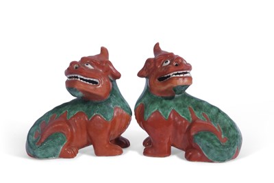 Lot 152 - Pair of Oriental Shi-Shi lions with a brown...