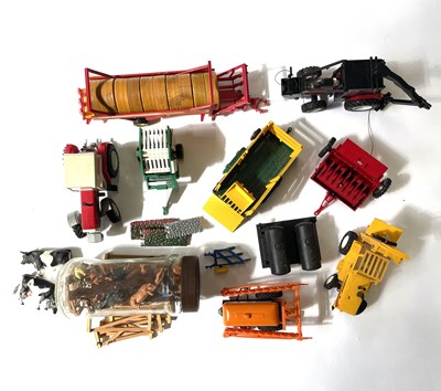 Lot 62 - A small quantity of die-cast farm vehicles,...