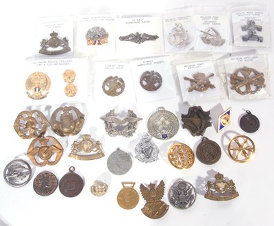 Lot 302 - Bag containing a good quantity of cap badges
