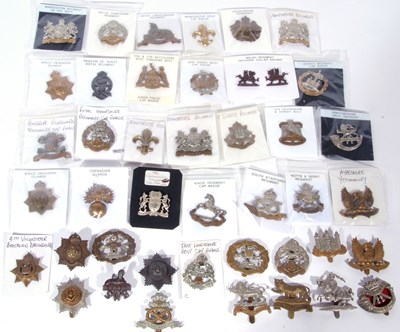 Lot 306 - Bag containing a good quantity of cap badges