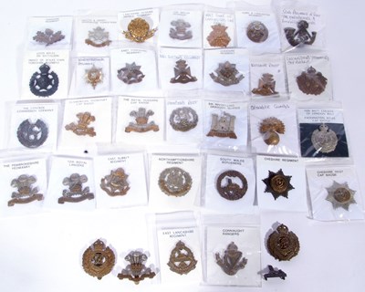 Lot 309 - Bag containing a good quantity of cap badges