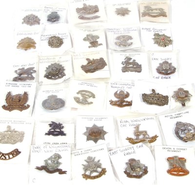 Lot 316 - Bag containing a good quantity of cap badges