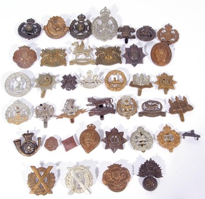 Lot 317 - Bag containing a good quantity of cap badges