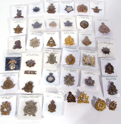 Lot 320 - Bag containing a good quantity of cap badges