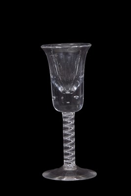 Lot 34 - A wine glass with bowl shaped bowl above a...