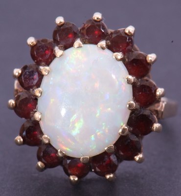 Lot 23 - 9ct gold opal and garnet cluster dress ring,...