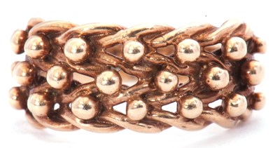 Lot 26 - 9ct gold Keeper ring of typical woven and bead...