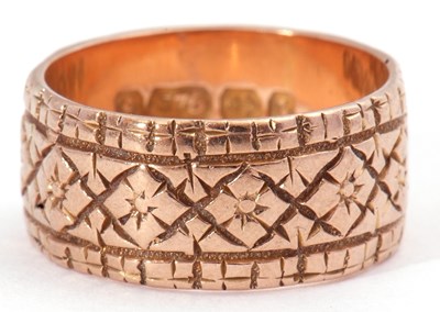 Lot 48 - 9ct gold wide band ring, a continuous chased...