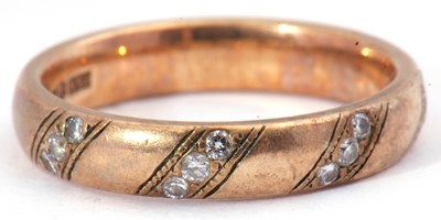 Lot 51 - 9ct gold and diamond ring featuring four small...