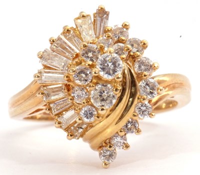 Lot 95 - 18ct gold and diamond cluster ring, a swirl...