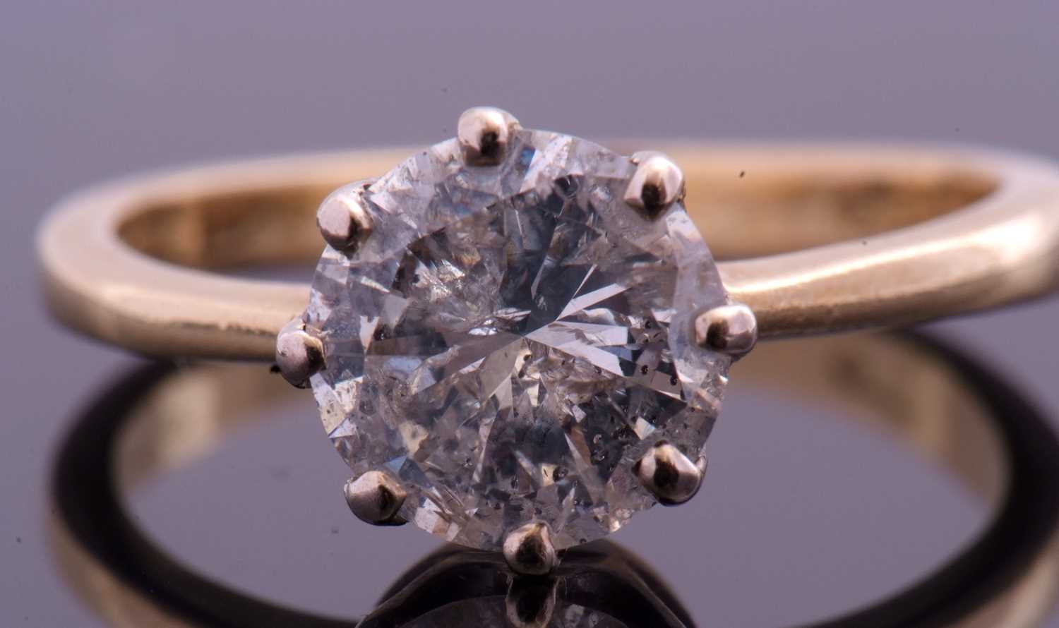 Lot 102 - Diamond single stone ring, a round brilliant...