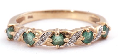 Lot 124 - Modern diamond and emerald half eternity ring,...