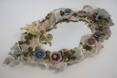 Lot 336 - Shaped Sitzendorf mirror surrounded with...
