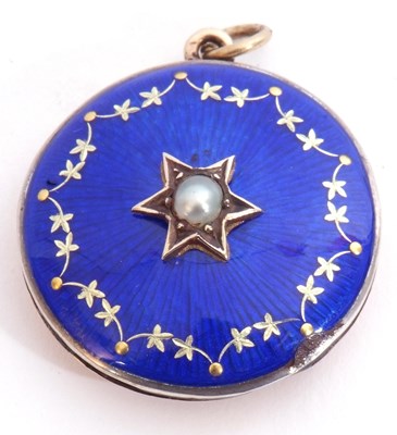 Lot 217 - Blue enamel locket of circular form centring a...