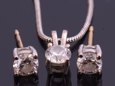 Lot 247 - Pair of diamond stud earrings of round...