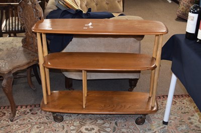 Lot 551 - Small Ercol three tier shelf unit or room...