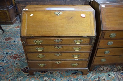 Lot 661 - Georgian mahogany bureau of typical form with...