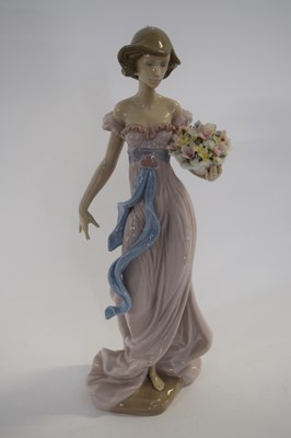 Lot 348 - Lladhro figure of a young girl holding a...