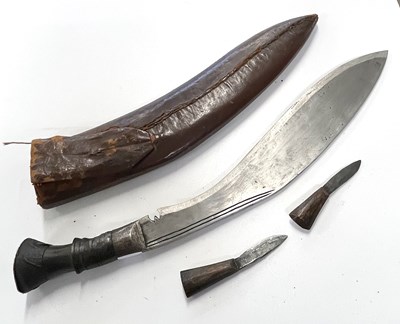 Lot 110 - 20th Century Nepalese/Indian kukri in leather...