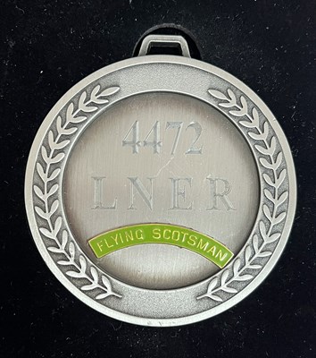 Lot 263 - A commemorative silver award medal to 4472...