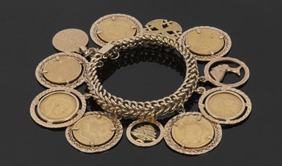 Lot 365 - Unmarked yellow metal curblink charm bracelet,...