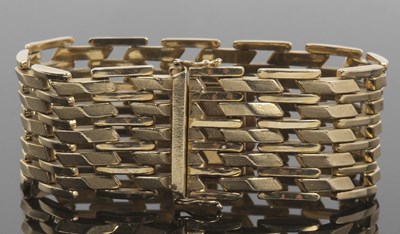 Lot 378 - 14ct jarretiere/cuff bracelet, with lightly...