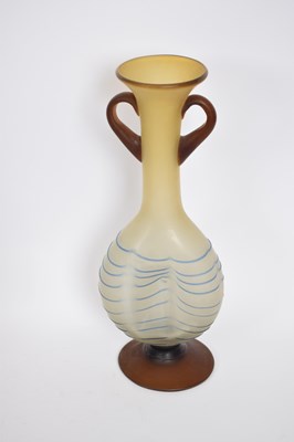 Lot 43 - Art glass vase of dimpled shape with loop...