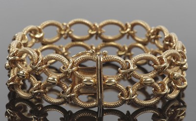 Lot 366 - Fancy link bracelet, comprosed of two rows of...