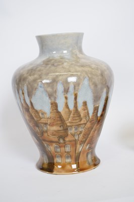 Lot 57 - Cobridge stoneware ewer decorated with plums...