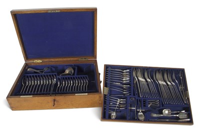 Lot 315 - A George V oak cased part canteen of flat...